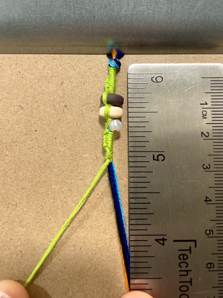 Figure 13. Step 14: Completed green left-hand knots after goal beads.
